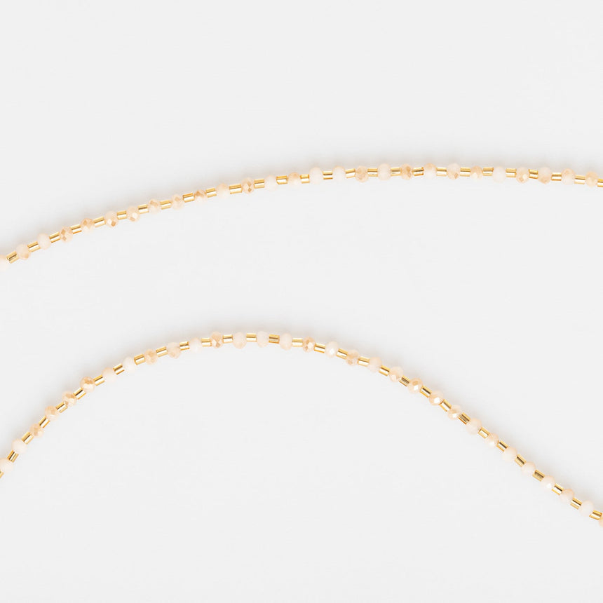 Gold and White Beaded Long Necklace with Flower Charm